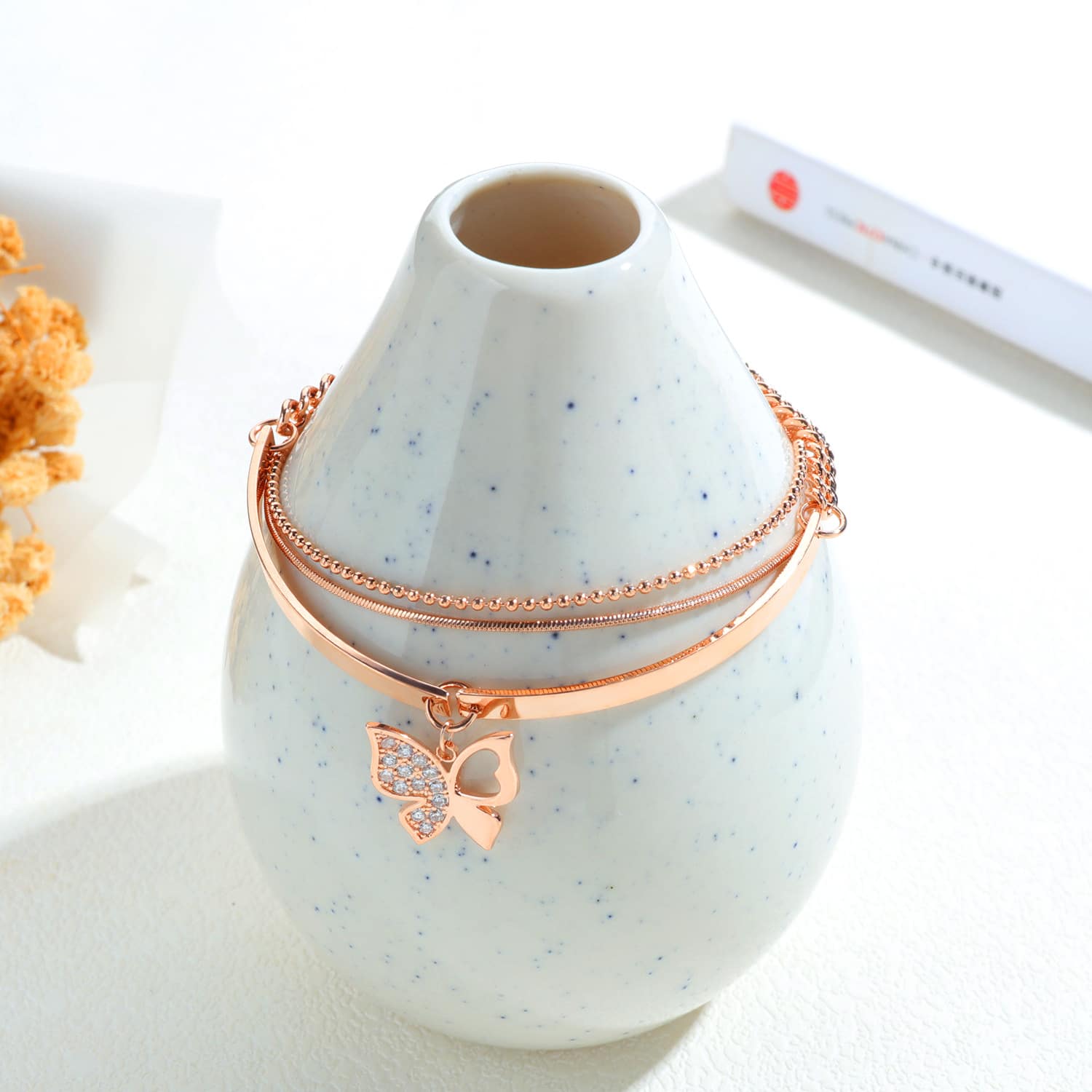 Sophisticated Rose Gold Bracelet with Charming Butterfly Detailing