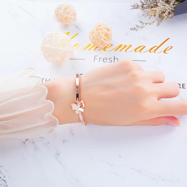Sophisticated Rose Gold Bracelet with Charming Butterfly Detailing - Image 7